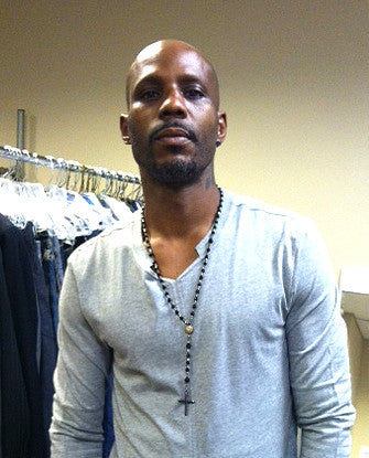 DMX wearing Rosary Black Diamond Earrings